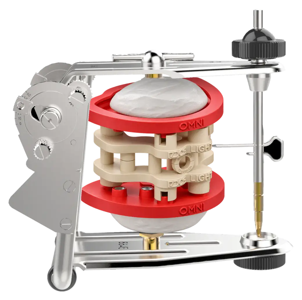 Illustration : articulateur Gerber Condylator Individual avec DACOS Omni Flex et le calibrateur montés entre ses deux branches