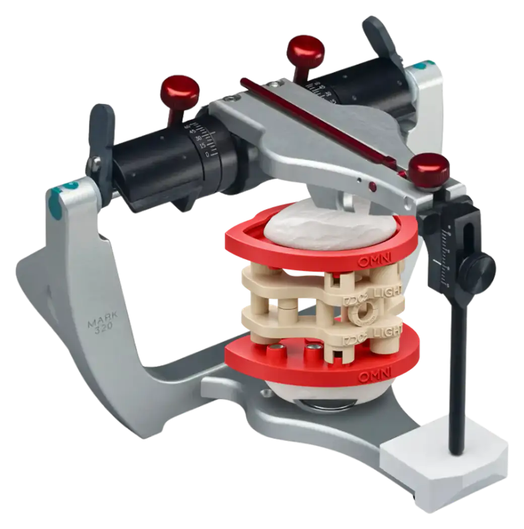Illustration : articulateur Denar Mark 320 avec DACOS Omni Flex et le calibrateur montés entre ses deux branches