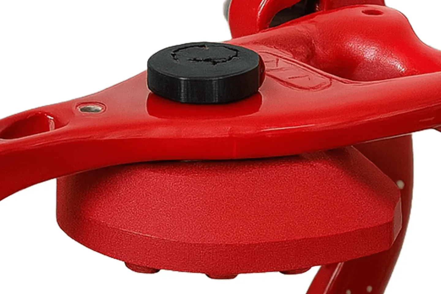 Plaque supérieure DACOS Omni ASA montée sous la branche supérieure d’un articulateur ASA Dental rouge, fixée par sa molette
