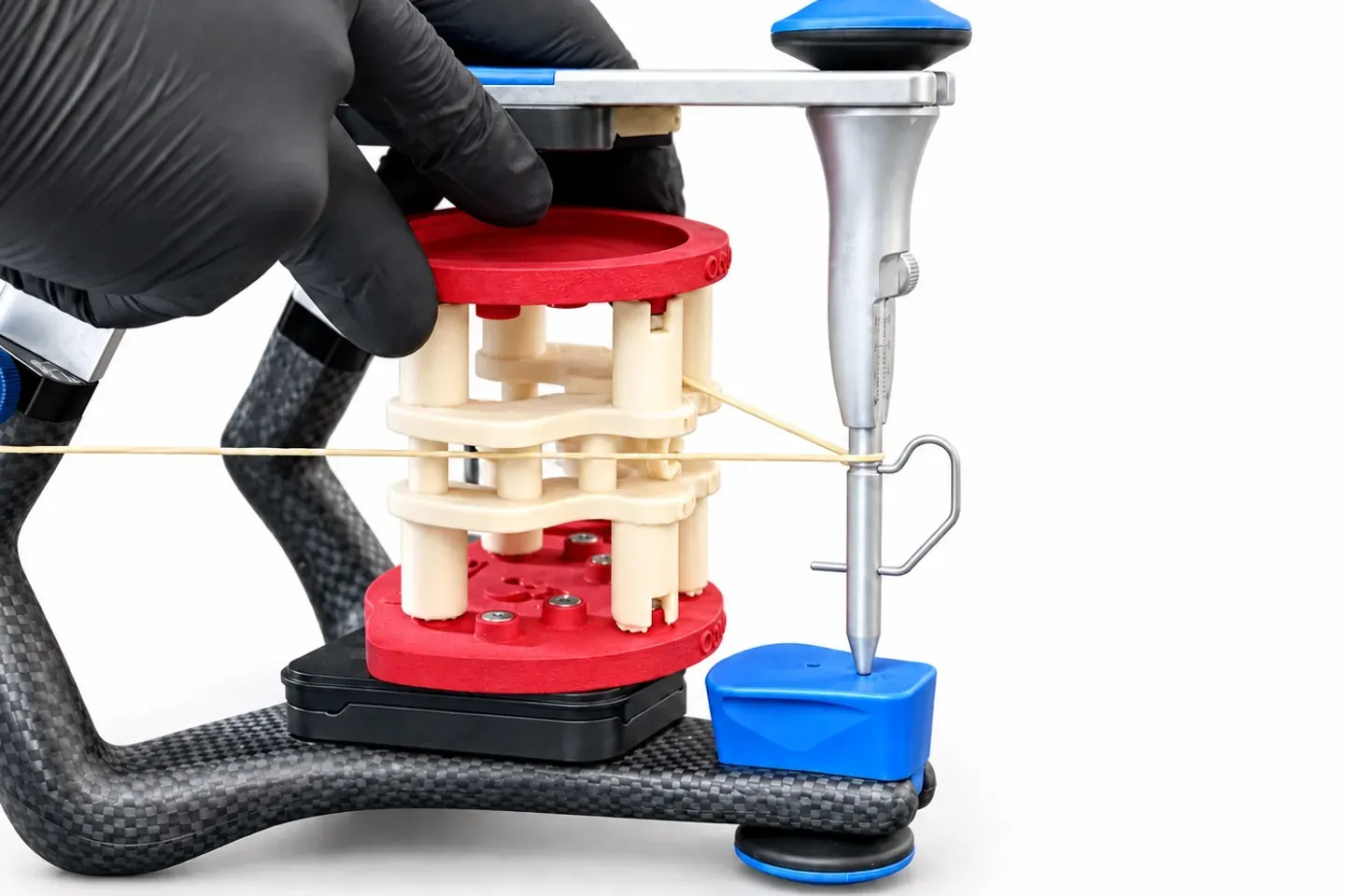 Bloc calibrateur avec les plaques Flex centré entre les branches de l’articulateur sur l’élastique